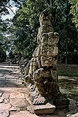 Preah Khan temple - west entrance of the fourth enclosure, the bridge lined by devas and asuras.